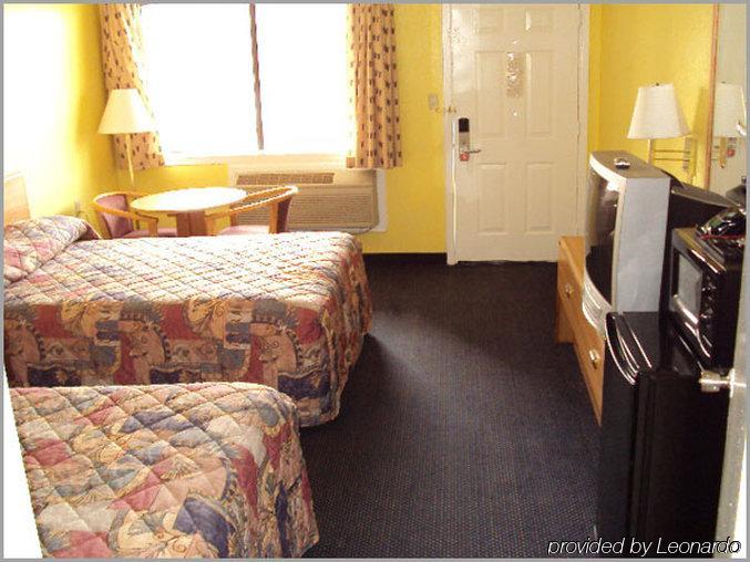 Regency Travel Inn Hayti Szoba fotó