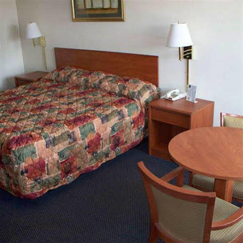 Regency Travel Inn Hayti Szoba fotó